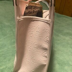 Juicy Tote new only been carried a couple of times